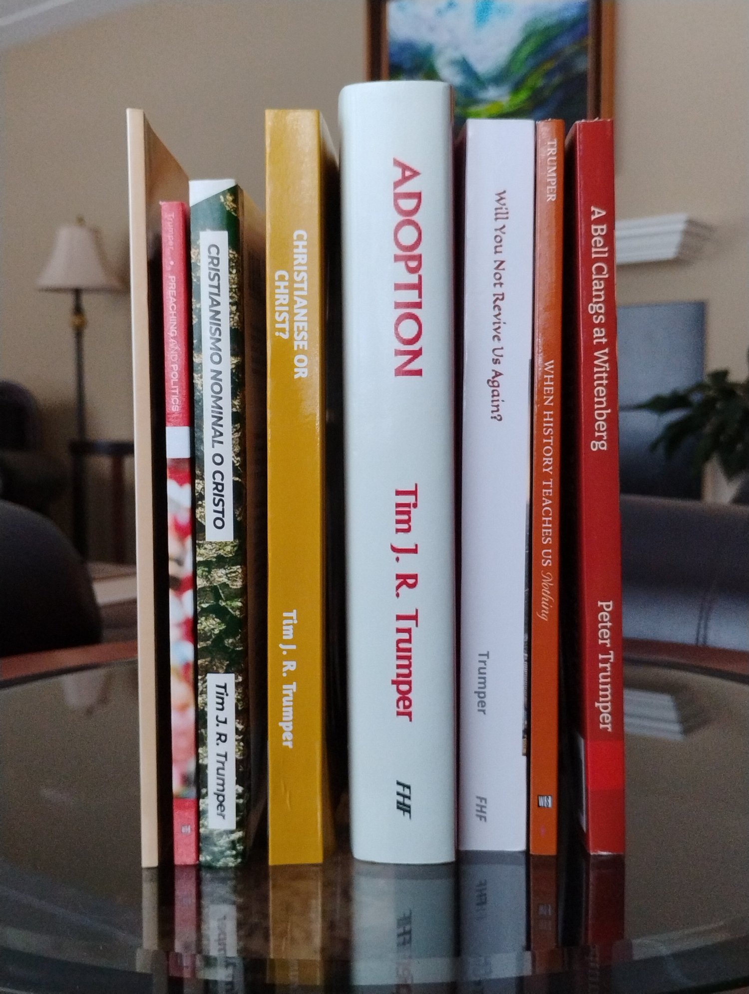 A row of From His Fullness books on a shelf